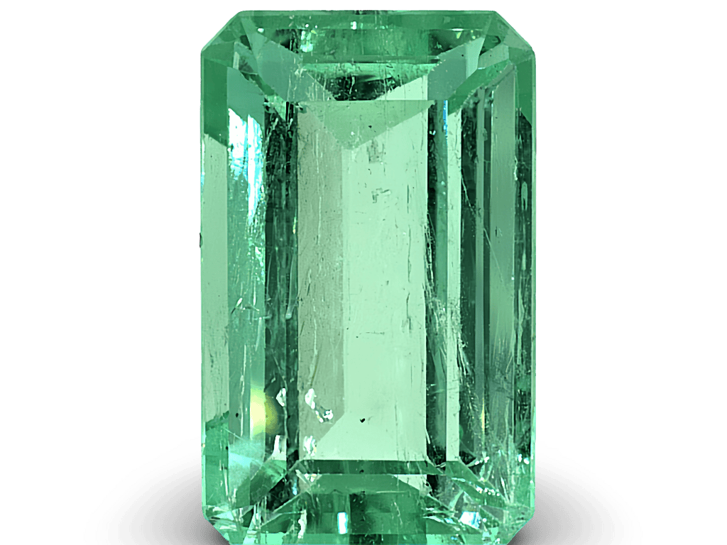 Bright green Colombian emerald cut gemstone with high clarity and brilliance.