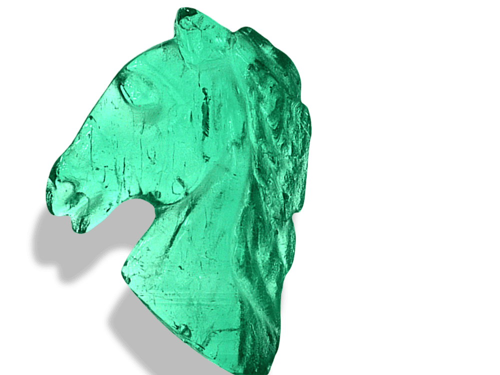 Deep green Colombian emerald with horse-head shape, VVS2 clarity, 1.98 carats.